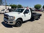 New 2024 Ram 3500 Tradesman Regular Cab 4x4 Flatbed Truck for sale #B64650 - photo 1