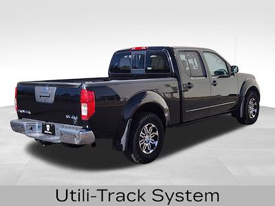 Used 2016 Nissan Frontier - photo 1