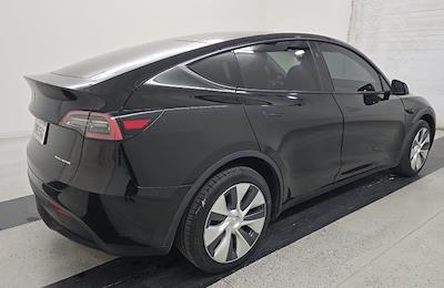 Used 2024 Tesla Model Y - photo 1