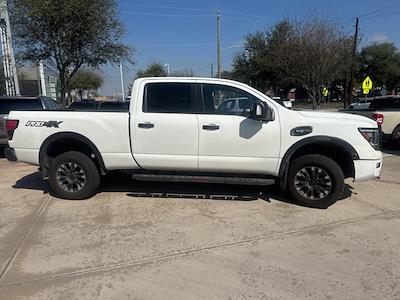 Used 2024 Nissan Titan XD - photo 1