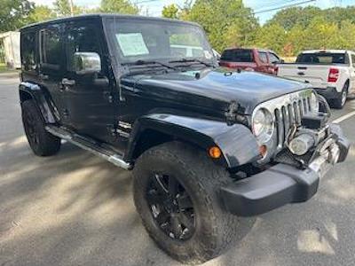 Used 2013 Jeep Wrangler Sahara for sale #A1P-04655 - photo 1