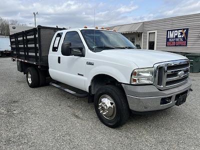 Used 2005 Ford F-350 Super Cab 4x4 Stake Bed for sale #4FT8615 - photo 1