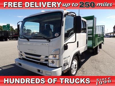 Used 2024 Isuzu NPR-HD Crew Cab Flatbed Truck for sale #R-31428 - photo 1