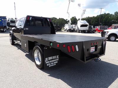 Used 2022 Ram 5500 Crew Cab 4x4 Flatbed Truck for sale #R-31907 - photo 2