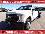 Used 2022 Ford F-350 Crew Cab 4x4 Flatbed Truck for sale #R-31947 - photo 1