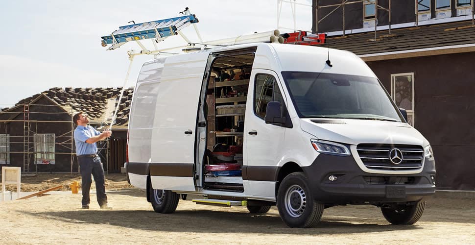 A white Sprinter van parked at a construction site near Euro Motorcars Mercedes-Benz dealership in Bethesda, MD.