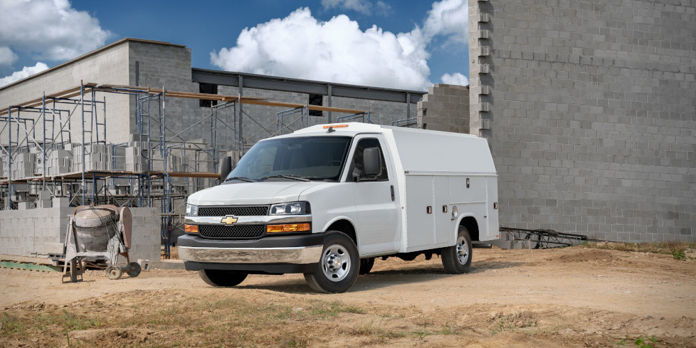 White Chevy Utility van on the job site