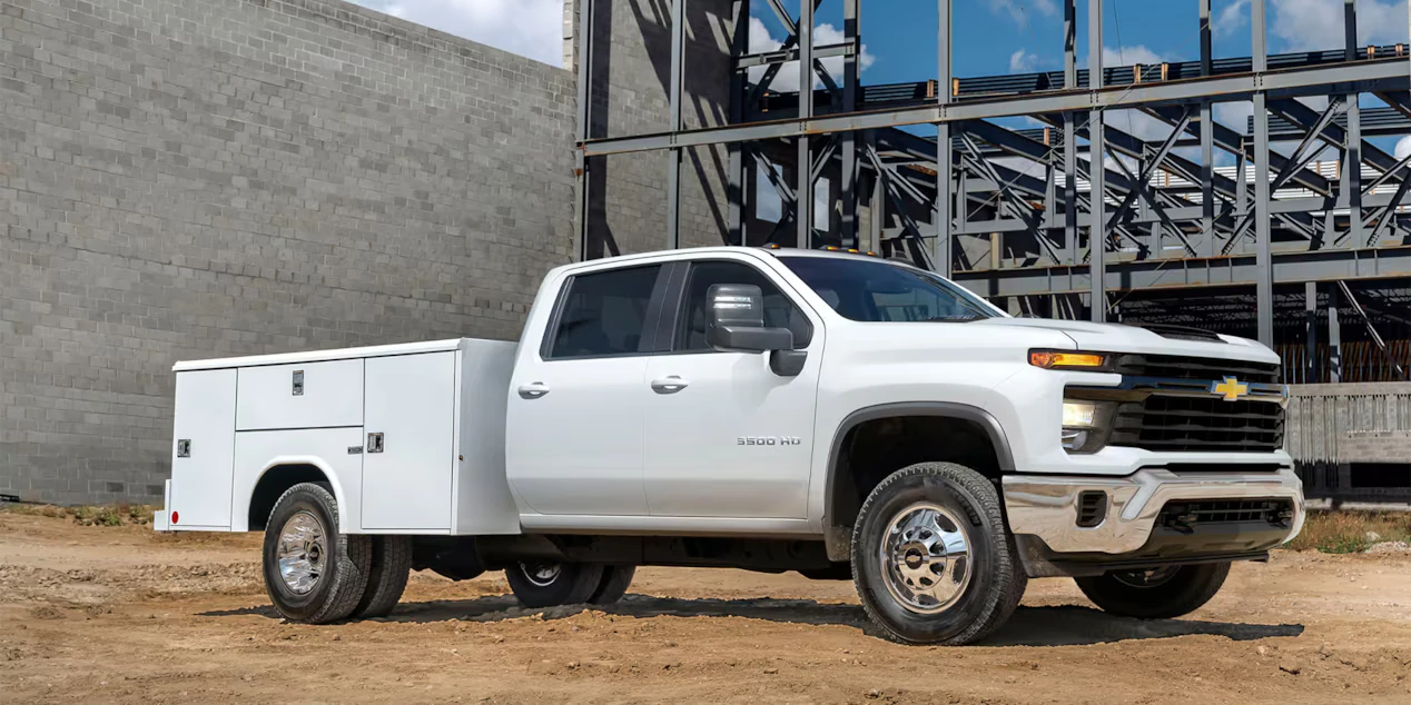 A new white Chevrolet service truck at Long-Lewis Chevrolet in AL, financing available!