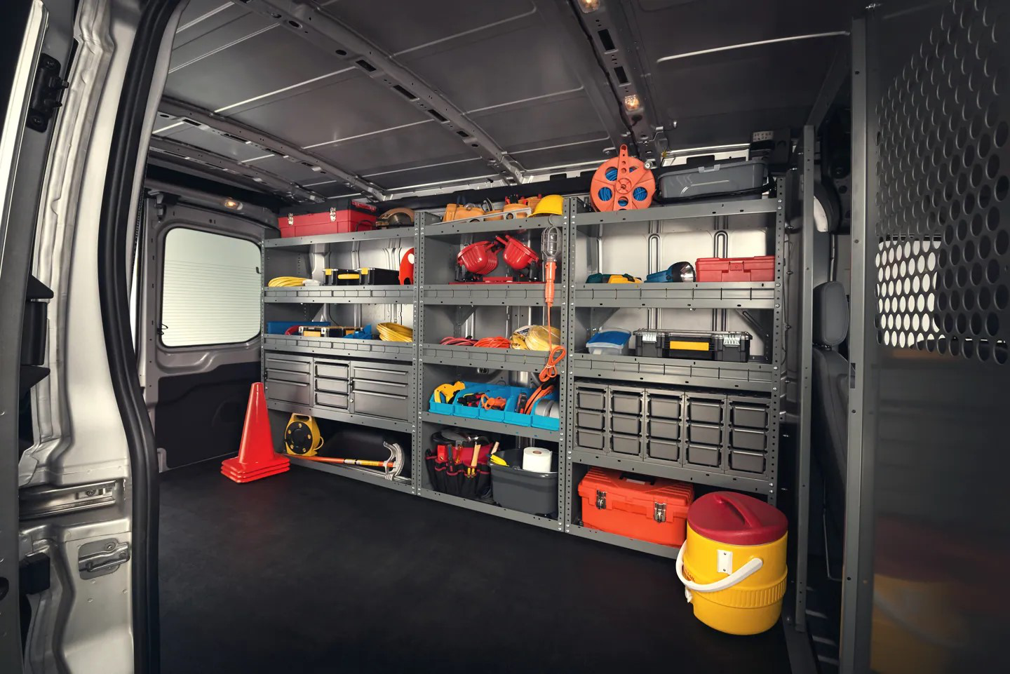 The modern and spacious interior of a Ford E-Transit van.