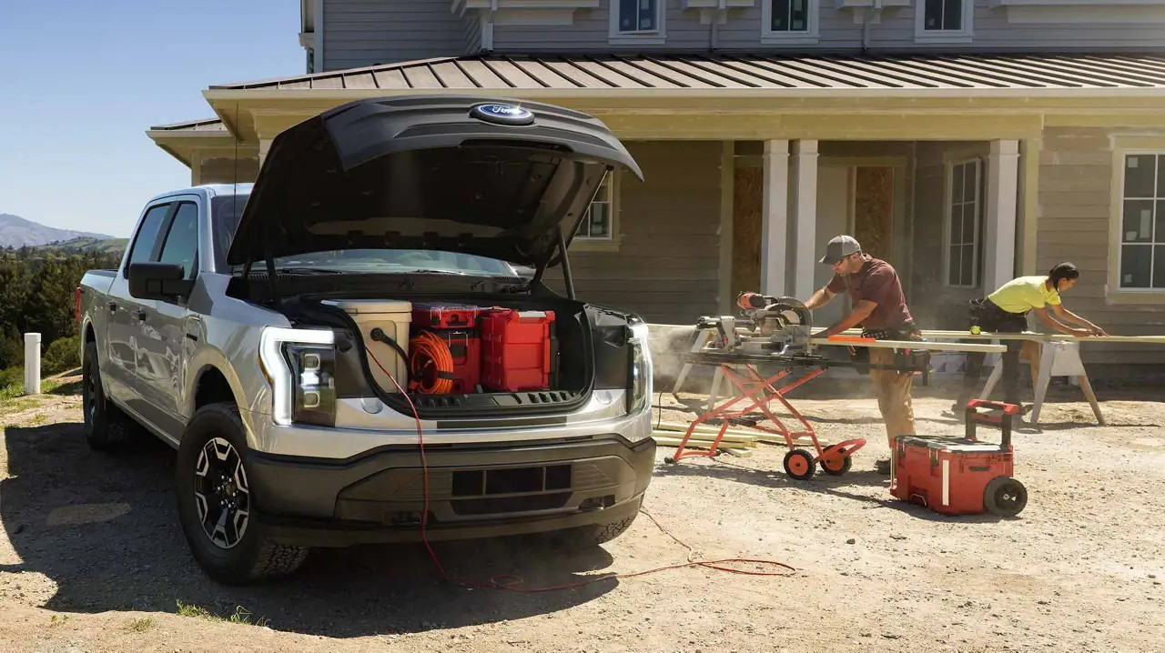 A construction crew relying on the Ford F-150 Lightning Pro for their daily tasks.